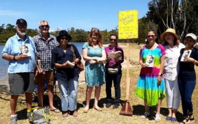 Reading circle shares joys of books with beach or bush backdrop