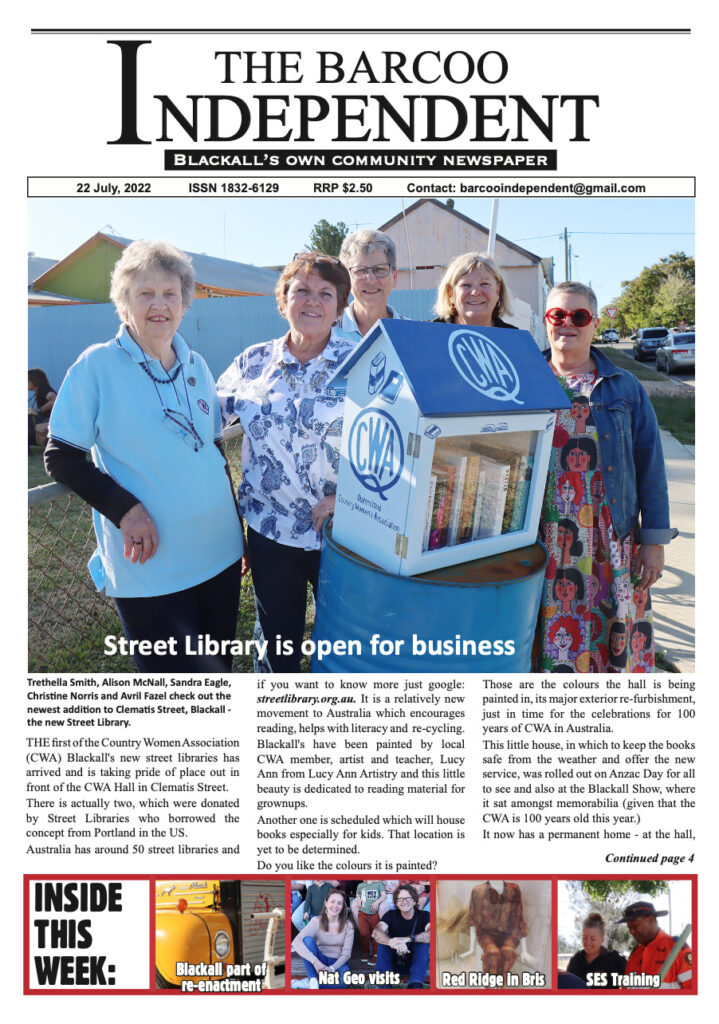 Members of the Blackall CWA with their new Street Library, on the front cover of The Barcoo Independent
