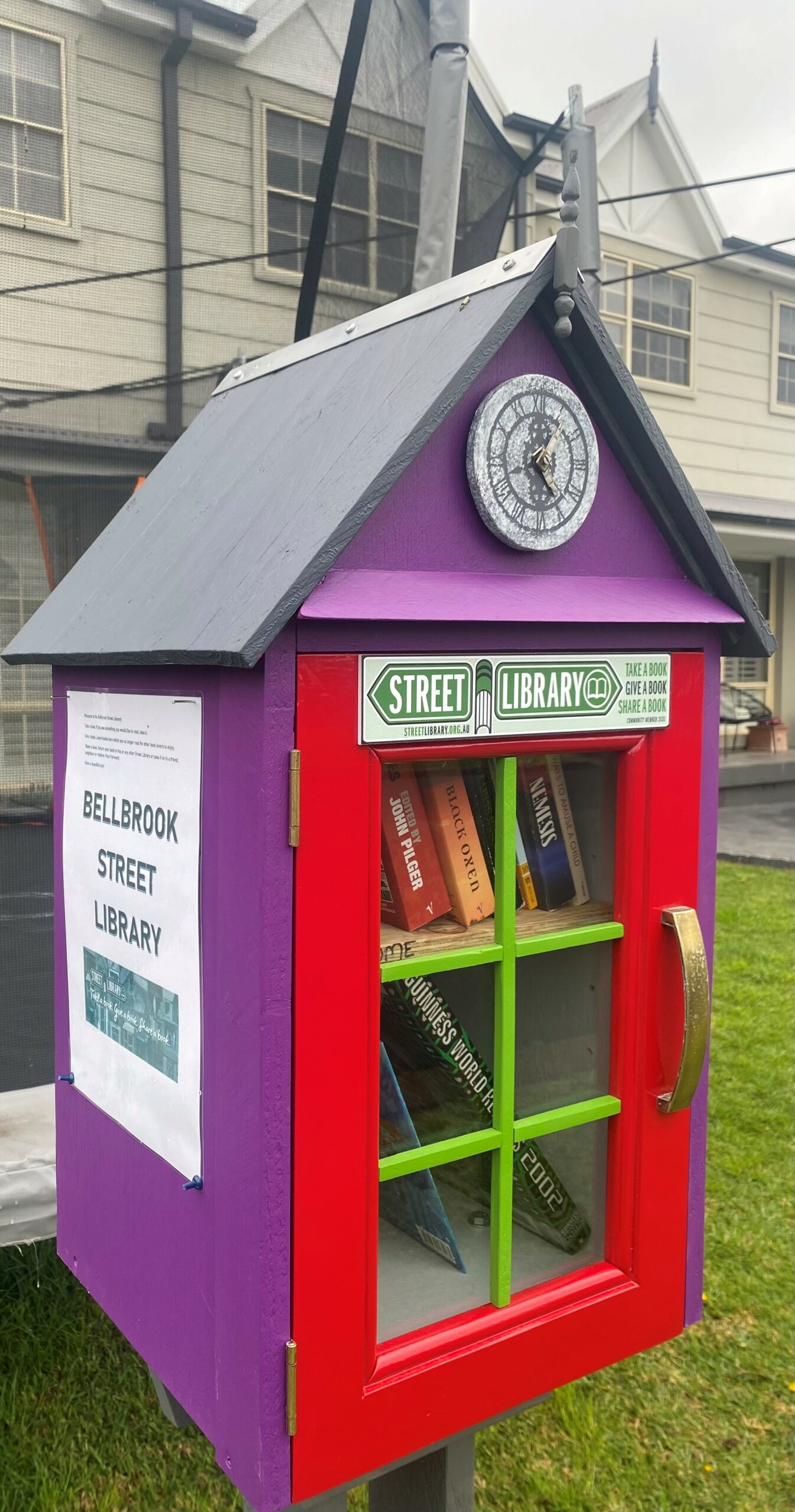 A Street Library painted in purple, red and green