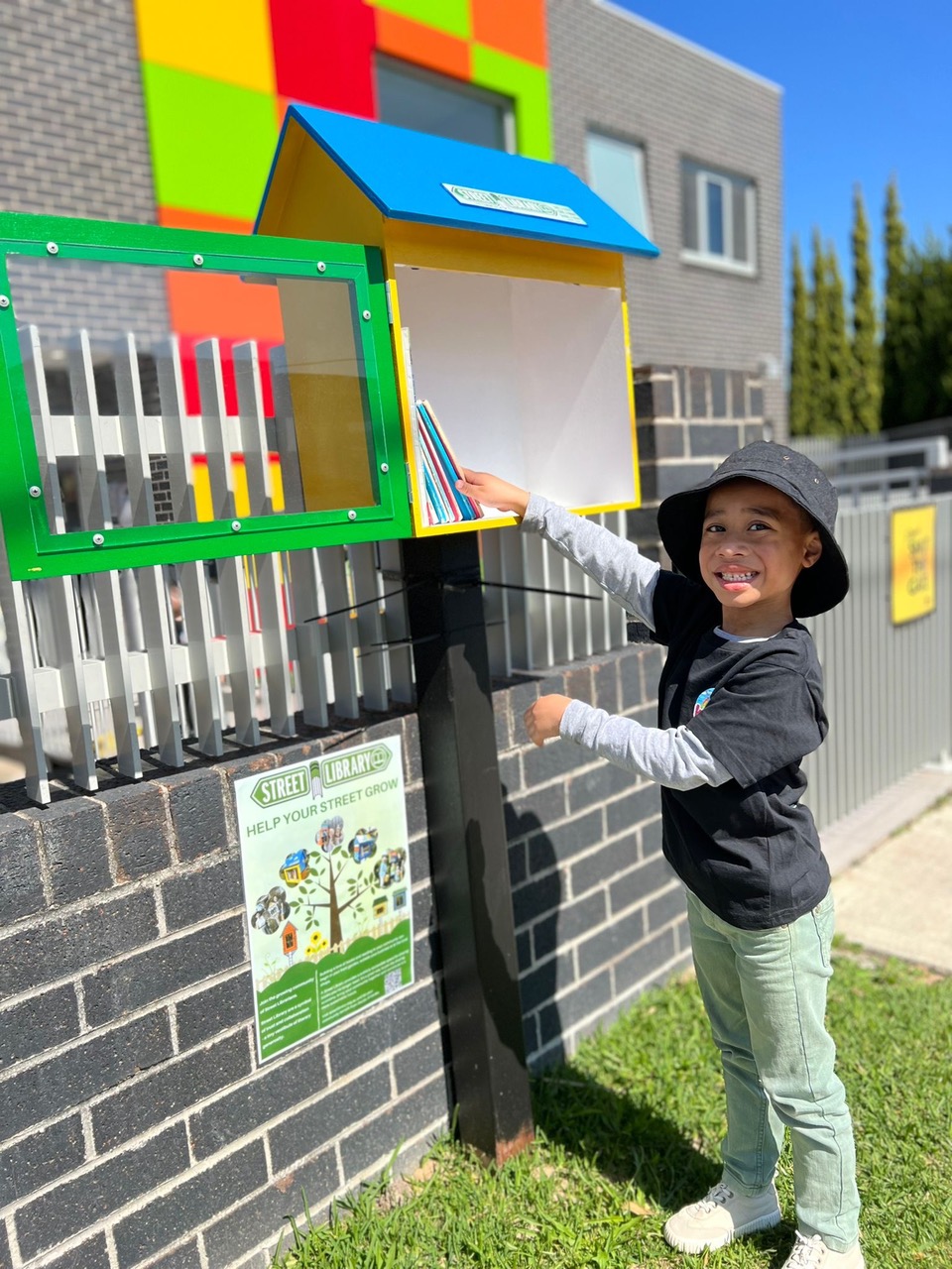 A child with a Street LIbrary
