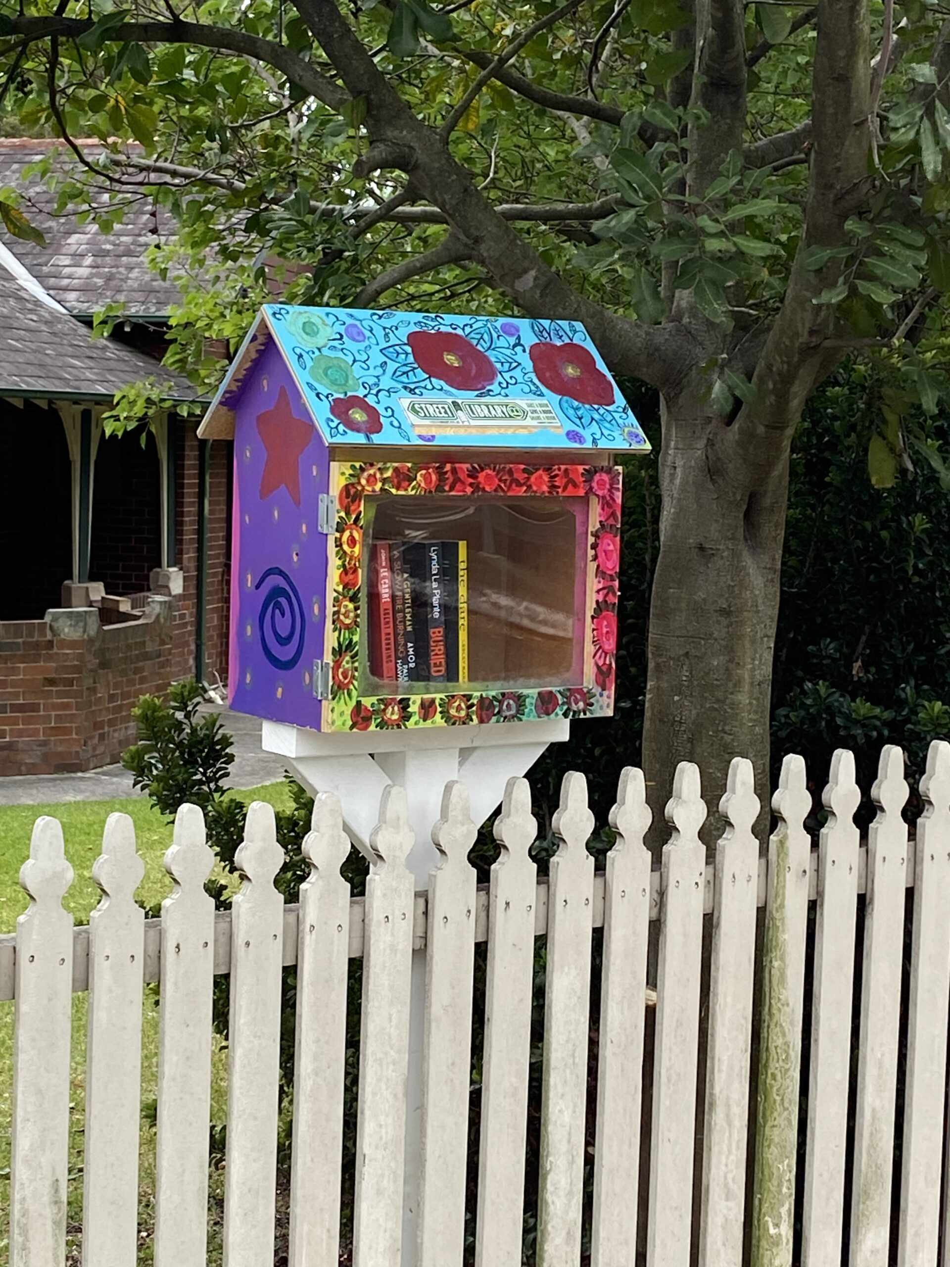 A blue Street Library in Tuross Heads, NSW.